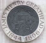 Greathead plaque on statue